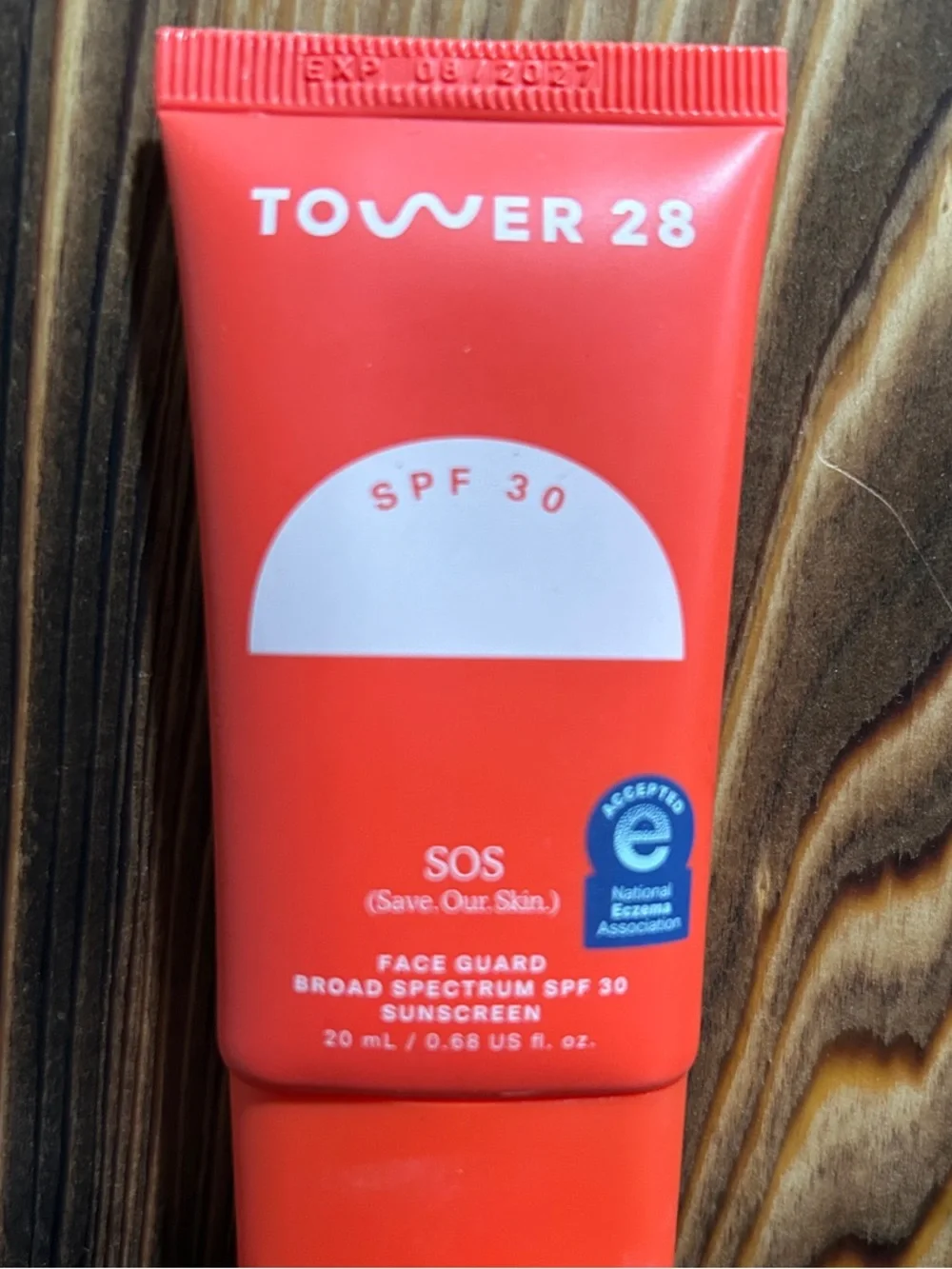 Tower 28 SOS Face Guard SPF 30 in bright red tube